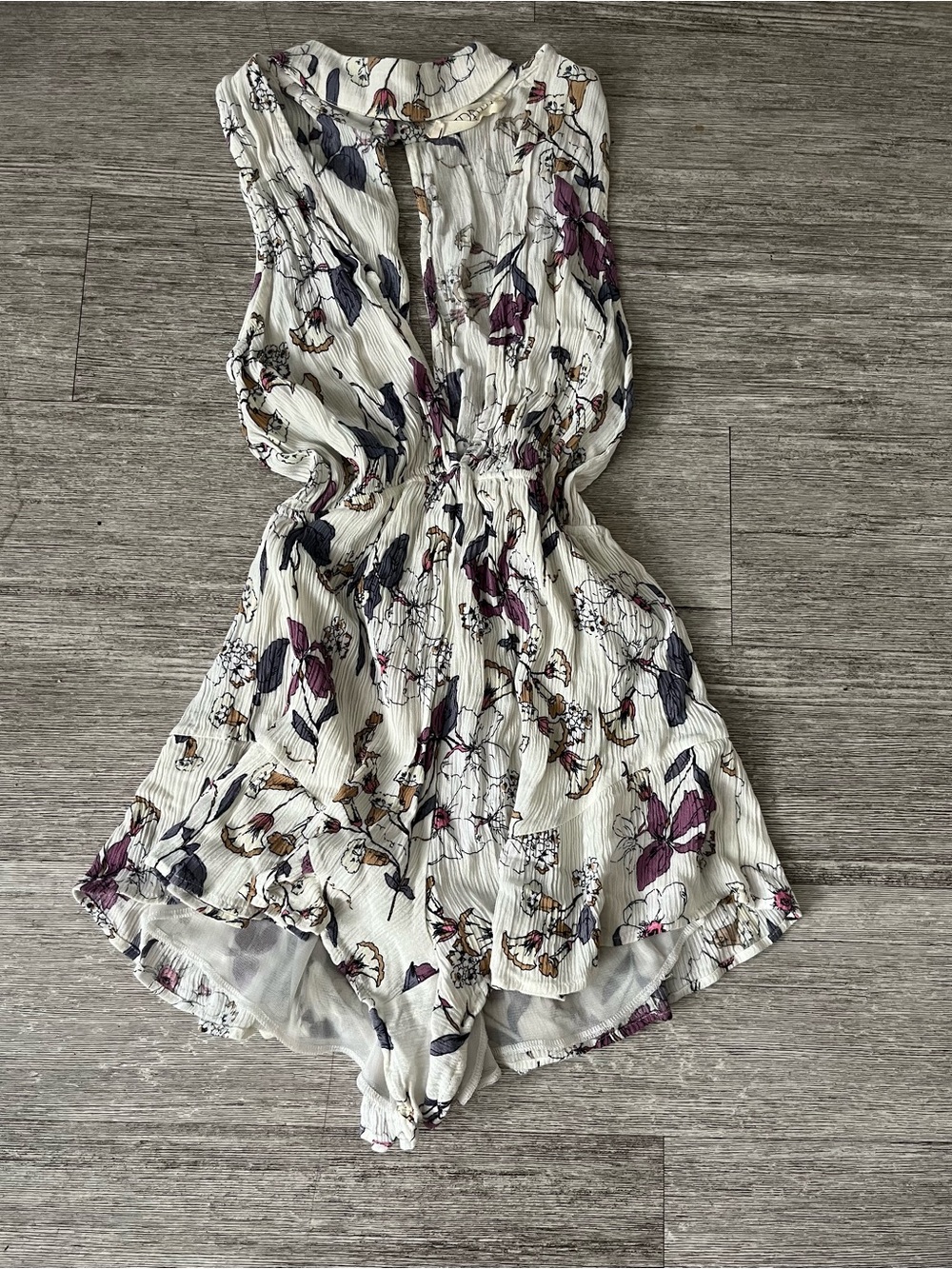 audrey Ivory Floral Sleeveless Romper with Purple and Navy Accents